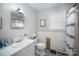 Clean bathroom with updated fixtures and wood-like tile at 131 E Branch Ave, Shelby, NC 28152
