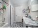 Bathroom with a tub, shower, and updated vanity at 131 E Branch Ave, Shelby, NC 28152