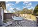Relaxing deck with seating area and view of backyard at 131 E Branch Ave, Shelby, NC 28152