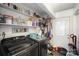 Laundry room with washer, dryer, and ample storage shelves at 131 E Branch Ave, Shelby, NC 28152