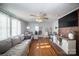 Spacious living room featuring hardwood floors and a view into the kitchen at 131 E Branch Ave, Shelby, NC 28152