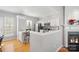 Modern kitchen with white cabinets and granite countertops at 5313 Dockery Dr, Charlotte, NC 28209