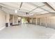 Large garage with ample storage and epoxy flooring at 235 Dashers Den None, Fort Mill, SC 29708