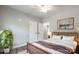 Cozy bedroom with a metal-framed bed, plenty of space, and a large plant at 5021 Oconee Dr, Stanley, NC 28164