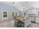 Bright kitchen with wood-look floors and center island at 480 Wyatt Grove Church Rd, Gold Hill, NC 28071