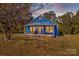 Charming blue house with a spacious front porch at 480 Wyatt Grove Church Rd, Gold Hill, NC 28071