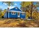 Blue house exterior with white trim, metal roof and patio at 480 Wyatt Grove Church Rd, Gold Hill, NC 28071