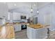 Modern kitchen with stainless steel appliances and butcher block island at 480 Wyatt Grove Church Rd, Gold Hill, NC 28071