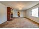 Living room with brick fireplace and carpeting at 2926 Englewood Dr, Shelby, NC 28150