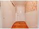 Entryway with wood floors, white door, and closet at 2926 Englewood Dr, Shelby, NC 28150