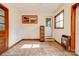 Sunroom with tiled floor, gas heater, and exterior access at 2926 Englewood Dr, Shelby, NC 28150