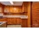 Wood kitchen cabinets and tiled countertops at 2926 Englewood Dr, Shelby, NC 28150