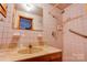 Bathroom includes shower, vanity with sink, and grab bars at 2926 Englewood Dr, Shelby, NC 28150