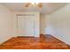 Bedroom with wood floors and sliding door closet at 2926 Englewood Dr, Shelby, NC 28150
