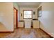 Bright laundry room, washer, dryer, and access to the bathroom at 2926 Englewood Dr, Shelby, NC 28150