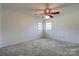 Spacious bedroom featuring a ceiling fan and carpet at 2926 Englewood Dr, Shelby, NC 28150
