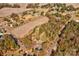 Aerial view of property showing home, land, and nearby pond at 2926 Englewood Dr, Shelby, NC 28150
