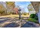 Landscaped yard with a decorative lamp post at 2926 Englewood Dr, Shelby, NC 28150