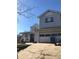 Two-story house with attached garage, viewed from the side at 8540 Indian Summer Trl, Harrisburg, NC 28075