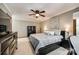 Spacious bedroom with a king-size bed and ample dresser space at 16008 Samar Ct, Tega Cay, SC 29708