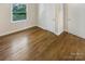 Spacious bedroom featuring hardwood floors and ample closet space at 2614 Bancroft St, Charlotte, NC 28206