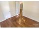 Hardwood floor bedroom with access to other rooms at 2614 Bancroft St, Charlotte, NC 28206