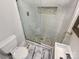 Updated bathroom with a walk-in shower and new vanity at 2614 Bancroft St, Charlotte, NC 28206