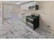 Modern kitchen with white cabinets and new appliances at 2614 Bancroft St, Charlotte, NC 28206