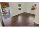 Bright living room with hardwood floors and access to front porch at 2614 Bancroft St, Charlotte, NC 28206