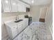 Renovated kitchen, white cabinets, and modern appliances at 2614 Bancroft St, Charlotte, NC 28206