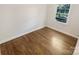 Spacious bedroom featuring hardwood floors and a window at 2614 Bancroft St, Charlotte, NC 28206