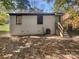 Newly painted brick house with a backyard and steps at 2614 Bancroft St, Charlotte, NC 28206