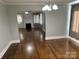 Hardwood floors and view of living room from dining area at 37722 Us 52 N Hwy, New London, NC 28127