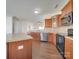 Kitchen island and stainless steel appliances at 620 Smokehouse Ln, Albemarle, NC 28001
