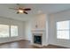 Living Room with hardwood floors, fireplace, and ceiling fan at 620 Smokehouse Ln, Albemarle, NC 28001