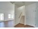 Carpeted staircase leading to the upper level at 620 Smokehouse Ln, Albemarle, NC 28001