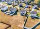 Aerial view of houses and properties in a residential neighborhood at 620 Smokehouse Ln, Albemarle, NC 28001