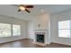 Living Room with hardwood floors, fireplace, and ceiling fan at 620 Smokehouse Ln, Albemarle, NC 28001