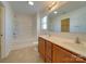 Bathroom with double vanity, bathtub, and toilet at 620 Smokehouse Ln, Albemarle, NC 28001
