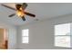 Bright bedroom with two windows and ceiling fan at 620 Smokehouse Ln, Albemarle, NC 28001