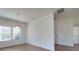 Bright dining room with hardwood floors and a chandelier at 620 Smokehouse Ln, Albemarle, NC 28001
