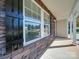 Charming house exterior with stone facade and black shutters at 620 Smokehouse Ln, Albemarle, NC 28001