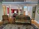 Spacious living room with high ceilings, formal dining area, and hardwood floors at 103 Berea Baptist Church Rd, Stanfield, NC 28163