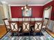 Formal dining room with large table and hardwood floors at 103 Berea Baptist Church Rd, Stanfield, NC 28163