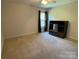 Bedroom with window, carpet, and entertainment center at 103 Berea Baptist Church Rd, Stanfield, NC 28163