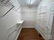Large walk-in closet with wire shelving and hanging rods at 103 Berea Baptist Church Rd, Stanfield, NC 28163