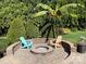Landscaped backyard with firepit and seating area at 103 Berea Baptist Church Rd, Stanfield, NC 28163