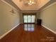 Main bedroom with hardwood floors and fireplace at 103 Berea Baptist Church Rd, Stanfield, NC 28163