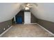 Spacious attic bedroom with carpeted floor and ceiling fan at 103 Berea Baptist Church Rd, Stanfield, NC 28163
