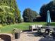 Outdoor patio with seating area and umbrella at 103 Berea Baptist Church Rd, Stanfield, NC 28163